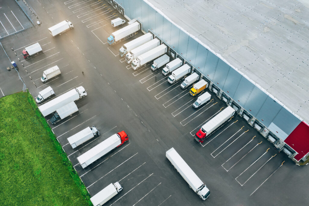 Aerial View Of Many Trucks At The Loading Docks Of 2025 03 18 15 32 15 Utc 1024x682